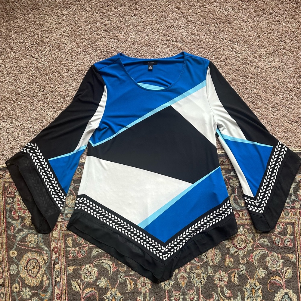 Cute asymmetrical printed blouse!